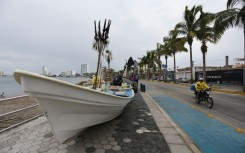Boats were brought ashore ahead of the arrival of Hurricane Orlene on Mexico's Pacific coast