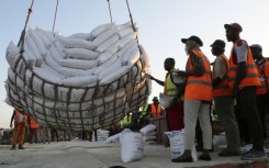 Precious cargo: A consignment of imported rice lands on Monday in Moroni