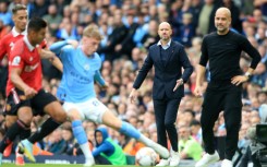 Manchester United manager Erik ten Hag (2nd right) wants to reach the standard of Premier League champions Manchester City
