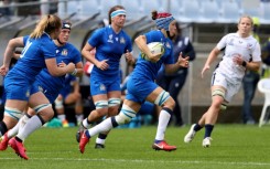 Italy's captain Elisa Giordano runs at the United States defence in Whangarei