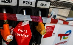 The government is pressing the oil giants who run the stations to settle the dispute