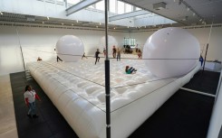 The installation looks like a bouncy game of giant-sized billiards