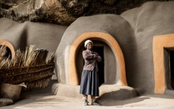The cave is divided into several round houses propped against the basalt rock