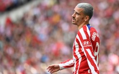 Atletico Madrid's French forward Antoine Griezmann has signed permanently for the club from Barcelona