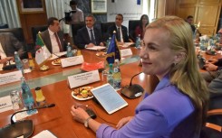 European Union's energy commissioner Kadri Simson (R) and members of her delegation attend a meeting with Algeria's Minister of Energy and Mines Mohamed Arkab