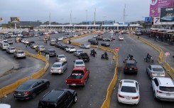 Cars queue to cross to the United States from Tijuana in northwestern Mexico