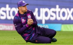 Scotland’s George Munsey takes a catch to dismiss West Indies' batsman Kyle Mayers