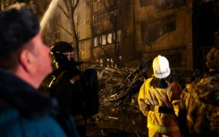 The Russian military jet crashed in a residential area of Yeysk in southwest Russia, causing a fire that engulfed a nine-storey building