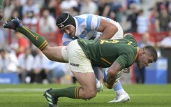 South Africa hooker Malcolm Marx (front) is tackled by Argentina lock Tomas Lavanini during a Rugby Championship match in  Buenos Aires on September 17, 2022.