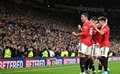 Manchester United beat Tottenham 2-0 to close within one point of the top four