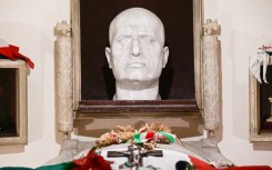 One hundred years after he took power, the cult of Benito Mussolini persists in the small Italian town of Predappio, where his tomb draws tens of thousands of visitors each year