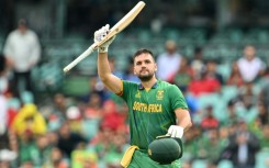 South Africa's Rilee Rossouw celebrates reaching his century