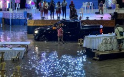 Landslides and flooding kill 13 people and leave seven missing in the southern Philippines