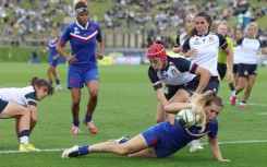  France's Joanna Grisez scores a try during their quarter-final match against Italy in Whangarei