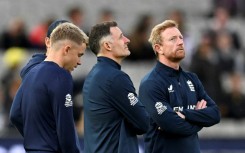 England's assistant coach Paul Collingwood (right) looks to the skies in Melbourne as their eagerly awaited T20 World Cup clash with Australia was abandoned last week