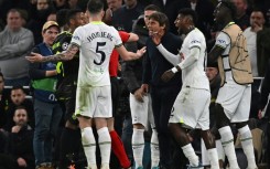 Antonio Conte (C) clashes with referee Danny Makkelie  during last Wednesday's draw