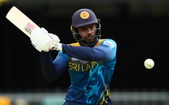 Sri Lanka's Dhananjaya de Silva crashes a four against Afghanistan at the Gabba