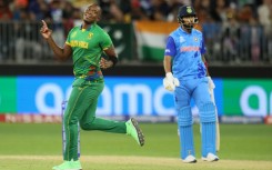 South Africa's Lungi Ngidi (L) celebrates after the dismissal of India's KL Rahul