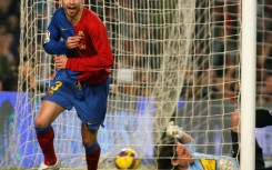 Gerard Pique celebrates during the 6-2 rout of Real Madrid in 2009.