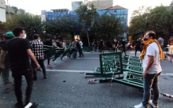 Demonstrators take to the streets of Tehran