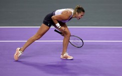 Aryna Sabalenka celebrates after defeating Iga Swiatek of Poland in the semi-finals of the WTA Finals in Fort Worth, Texas