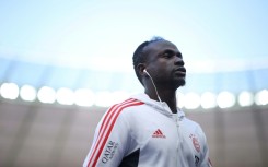Bayern Munich forward Sadio Mane went down with an injury in his side's home match against Werder Bremen on Tuesday