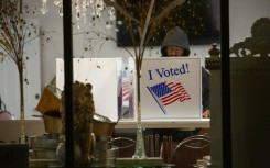 A voter casts his ballot  during the US midterm elections in Pittsburgh, Pennsylvania, on November 8, 2022