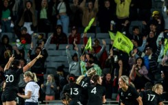 New Zealand flanker Sarah Hirini (second from left) leads the celebrations after their semi-final win over France