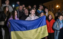 Crowds celebrated the Russian withdrawal from Kherson