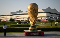 A giant replica of the World Cup trophy stands in front of the Al-Bayt Stadium where the tournament kicks off on November 20