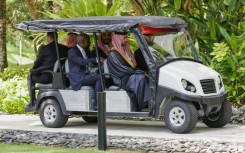 Saudi Arabia's Crown Prince Mohammed bin Salman rides a buggy during the G20 leaders' summit in Bali