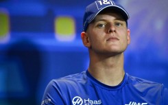 Mick Schumacher attends a press conference in Abu Dhabi ahead of his last race in Haas colours