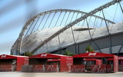 Budweiser beer stands outside the Khalifa International World Cup stadium in Doha