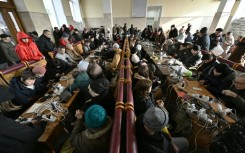 When retreating Russians left the city without power and water supplies as the harsh winter weather sets in