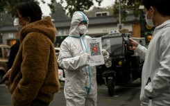 China's first coronavirus death in six months sparked fears officials would reimpose strict, economically painful restrictions