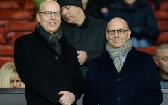 Avram (l) and Joel Glazer inherited United,  with brother Bryan, from their father Macolm in 2014