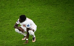 A disappointed Alphonso Davies digests Canada's 1-0 defeat to Belgium after missing a penalty that could have put his team ahead