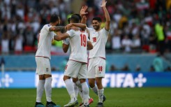 Iran celebrate their World Cup win against Wales