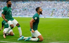 Saudi Arabia's Saleh al-Shehri celebrates after scoring his team's first goal, on the way to a 2-1 victory over Argentina that stunned the world