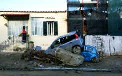 More than 200 rescuers are still searching for a dozen missing people