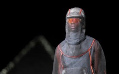 A model presents a creation at Dior fashion show at the Giza Pyramids on December 3