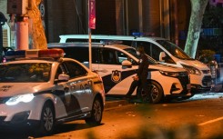 After a day of rare protests in China, police were out in force