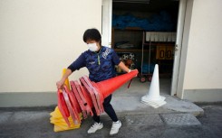 Masako Shimonomura, a Japanese middle school physical education teacher, says she loves her job but finds it hard to take a proper break in her day 