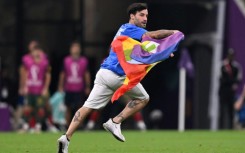 Mario Ferri, 35, who calls himself 'The Falcon', interrupted the Portugal-Uruguay game