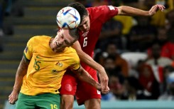 Australia's Mitchell Duke fights for the ball with Denmark defender Andreas Christensen