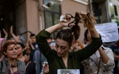 Support for Iranian protesters have spread worldwide, with women cutting their hair in solidarity