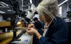 US hiring was stronger than expected in November, while unemployment held steady
