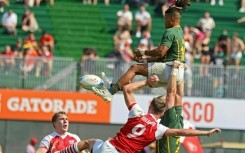 South Africa lost to Britain but advanced to the quarter-finals of the World Rugby Sevens Series in Dubai