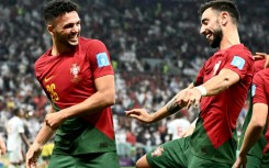 Goncalo Ramos (left) scored a hat-trick as Portugal beat Switzerland 6-1 at the World Cup