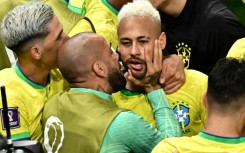 Brazil striker celebrates after scoring the 77th international goal of his career, matching Pele's Brazilian record